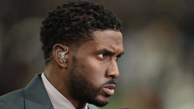 Former running back Reggie Bush looks on before broadcasting on Fox's College Football coverage.